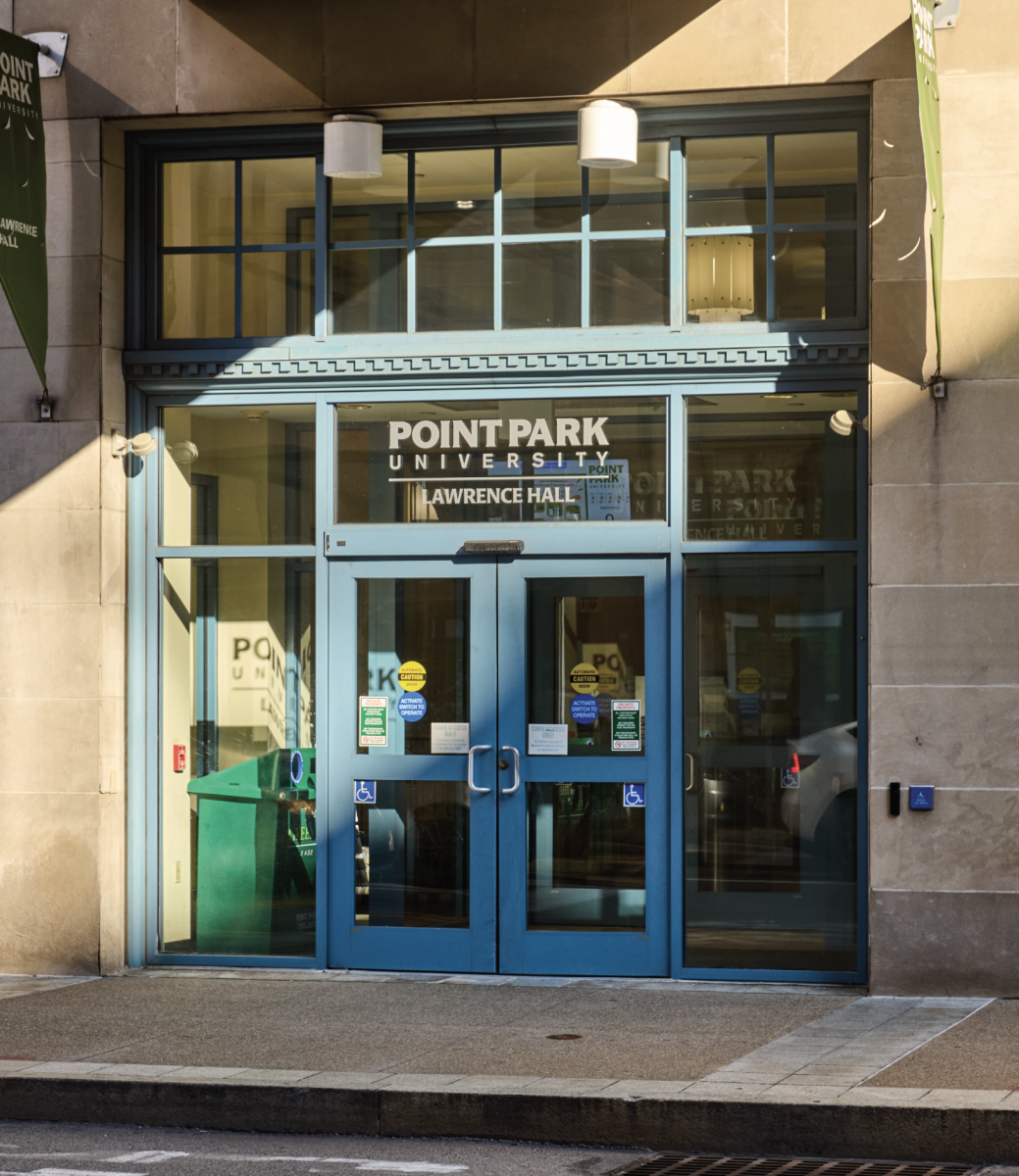 The Wood Street entrance of Lawrence Hall and the grate creating the alleged source of the “sewage” smell when the doors open.